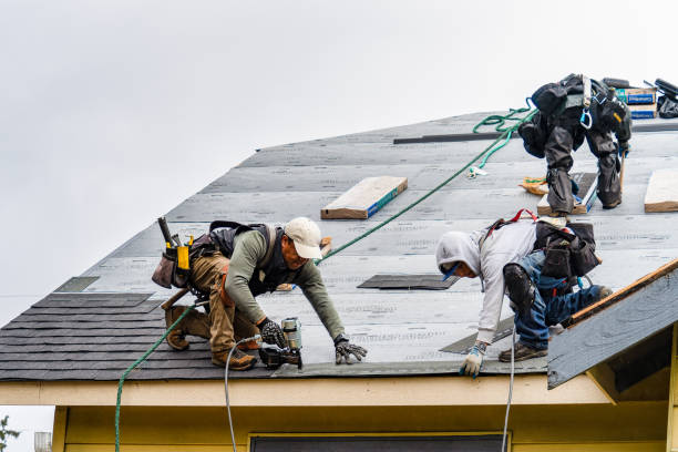 Professional Gutter Installation technician working in Running Springs, CA